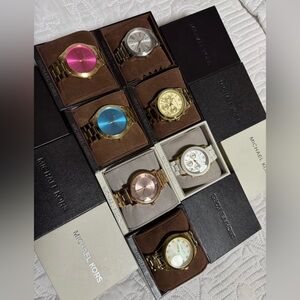 7- Authentic Michael Kors Watch.
